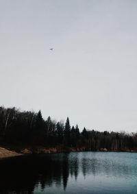 Scenic view of calm lake against clear sky