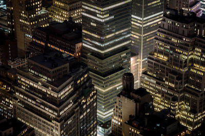 Aerial view of illuminated city at night