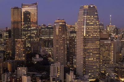 Office buildings at sunset as seen from tokyo tower.