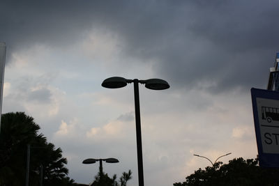 Low angle view of street light against sky