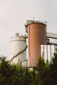 Low angle view of water tower against sky