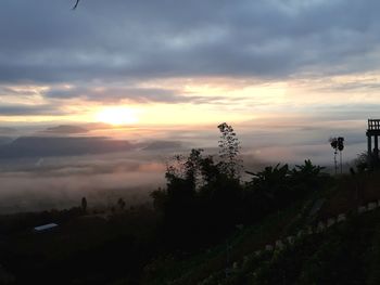 Scenic view of silhouette landscape against sky during sunset