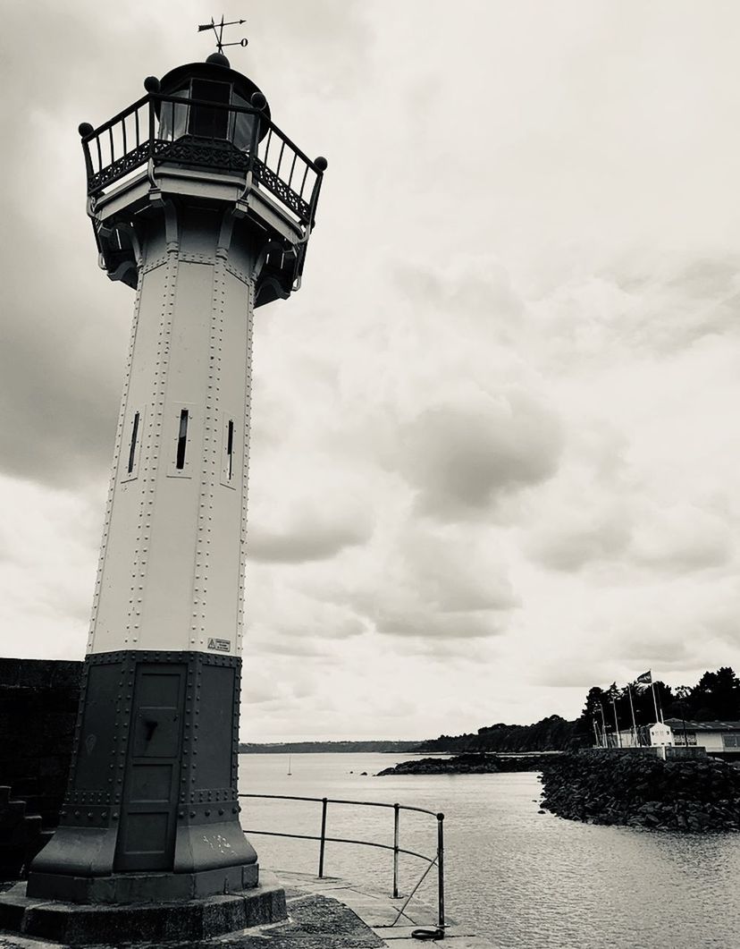 lighthouse, architecture, tower, water, built structure, sky, guidance, security, building exterior, cloud, protection, black and white, sea, nature, building, observation tower, travel destinations, monochrome photography, beach, monochrome, no people, day, travel, outdoors, coast, history, observation point, tourism, the past, land