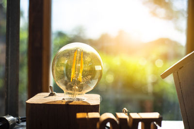 Close-up of crystal ball on table