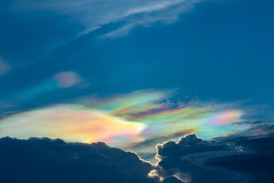 Low angle view of rainbow against sky