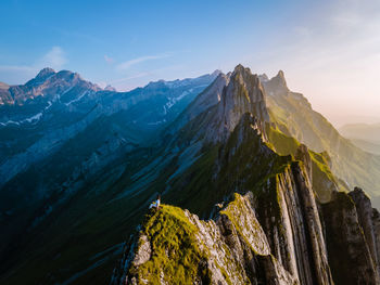 Panoramic view of snowcapped mountains against sky