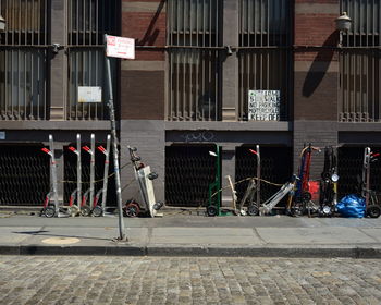 Carts for sale on sidewalk against building