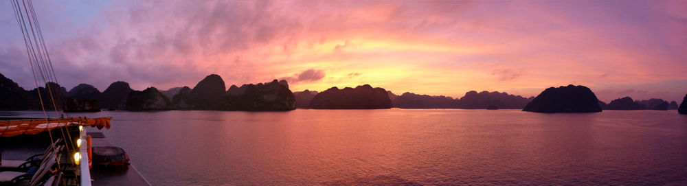 Panoramic view of river against sky during sunset