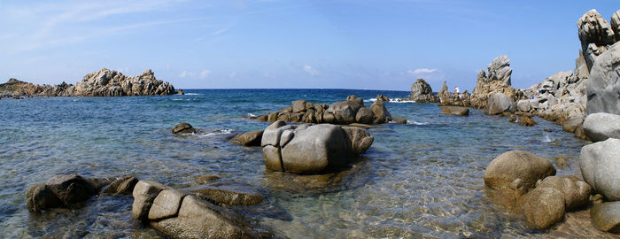 Scenic view of sea against blue sky