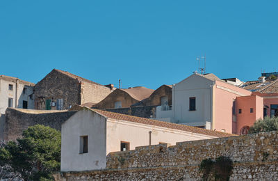 Low angle view of buildings against sky