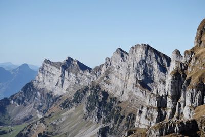 Panoramic view of mountains against clear sky