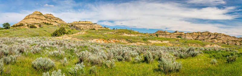 Panoramic view of rock formations against sky