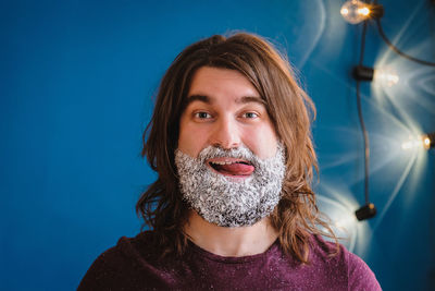 Portrait of man with sugar in beard