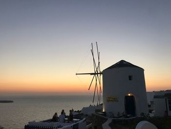 Scenic view of sea against clear sky during sunset