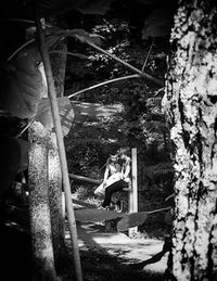 Woman walking on footpath