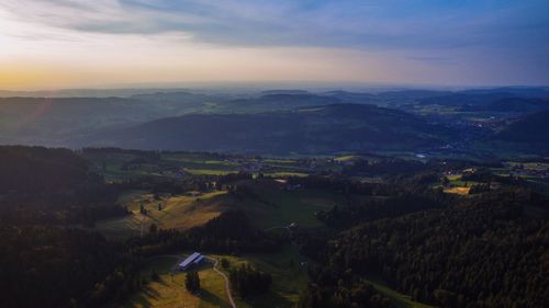 Scenic view of landscape against sky during sunset