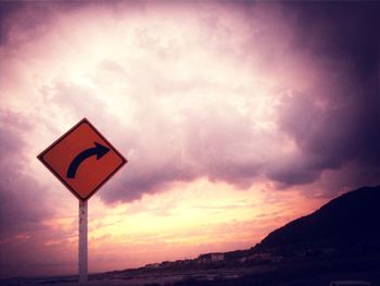 Scenic view of landscape against cloudy sky