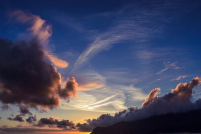 Low angle view of vapor trails in sky