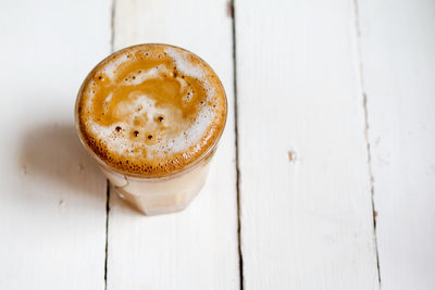 High angle view of cappuccino on table