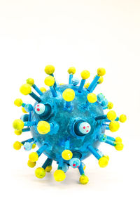 Close-up of multi colored pencils over white background