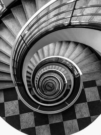 Directly below shot of spiral staircase of building