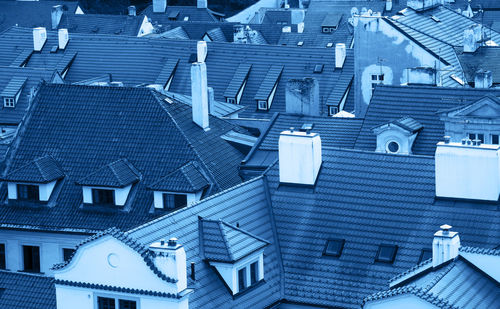 High angle view of roof and buildings in city