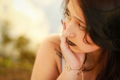 Close-up of thoughtful young woman