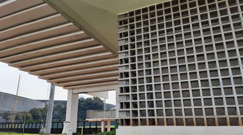 Low angle view of modern buildings against sky