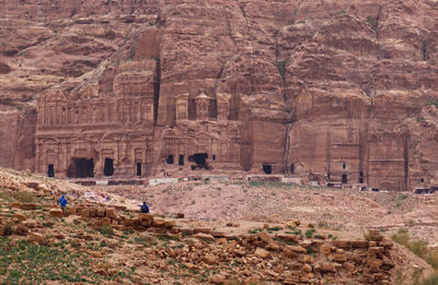 Group of people in front of historical building