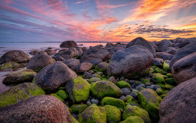 Scenic view of sea against sky at sunset