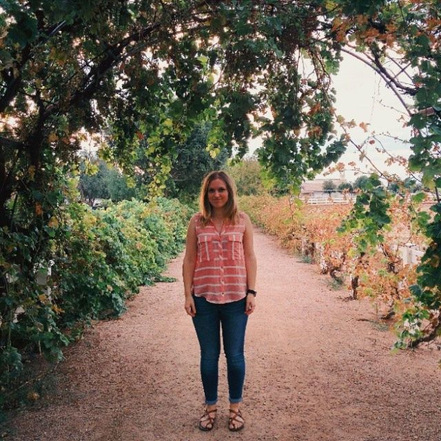 lifestyles, young adult, casual clothing, standing, tree, young women, looking at camera, leisure activity, portrait, front view, full length, person, the way forward, walking, footpath, growth, plant, day