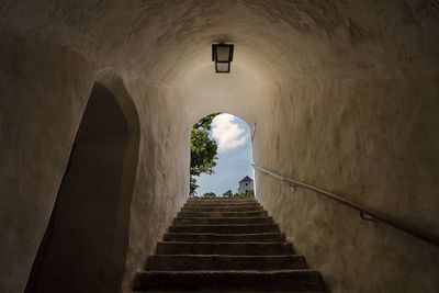 Low angle view of steps in tunnel