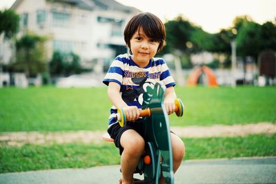 Boy riding bicycle