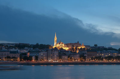 Illuminated buildings at waterfront, budapest