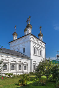 Low angle view of building against blue sky