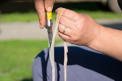 Close-up of person holding hands