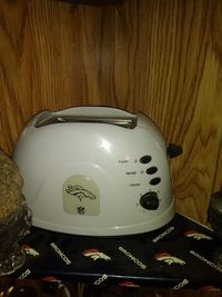 Close-up of toaster on table at home