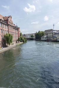 Buildings in city against sky