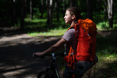 Man riding bicycle on field