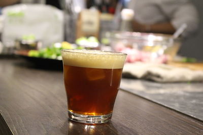 Close-up of beer on table