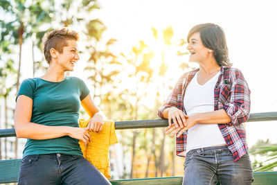 Lesbian couple at park in city