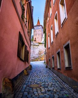 Narrow alley along buildings