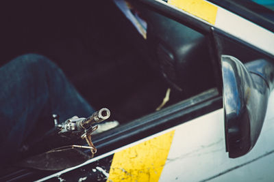 High angle view of rifle in police car