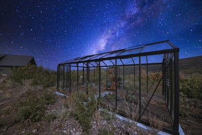 Scenic view of field against sky at night