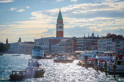 Piazza san marco by grand canal against sky