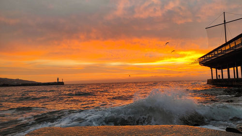 Scenic view of sea against sky during sunset