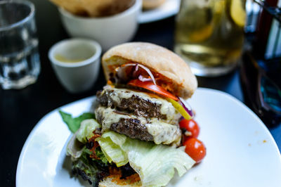 Close-up of hamburger on table