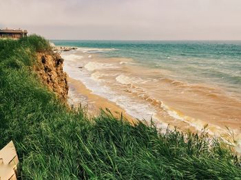 Scenic view of beach against sky