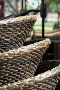 Close-up of wicker basket on wood