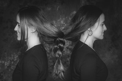 Side view of women with braided hair